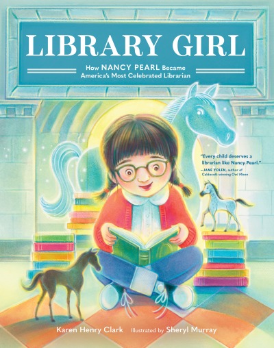Library Girl cover: young girl with dark hair, pigtails and glasses, sitting cross-legged reading a book, piles of books and horse figurines surrounding her.